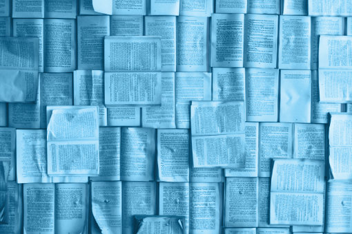 Open books covering a floor